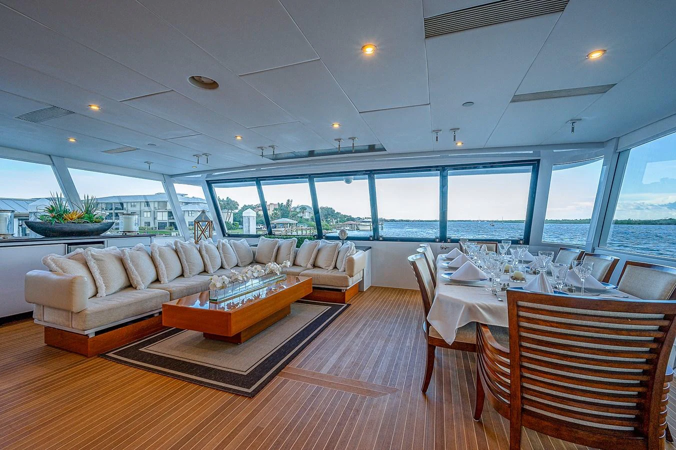 a living room with a large window aboard LA SIRENA Yacht for Sale