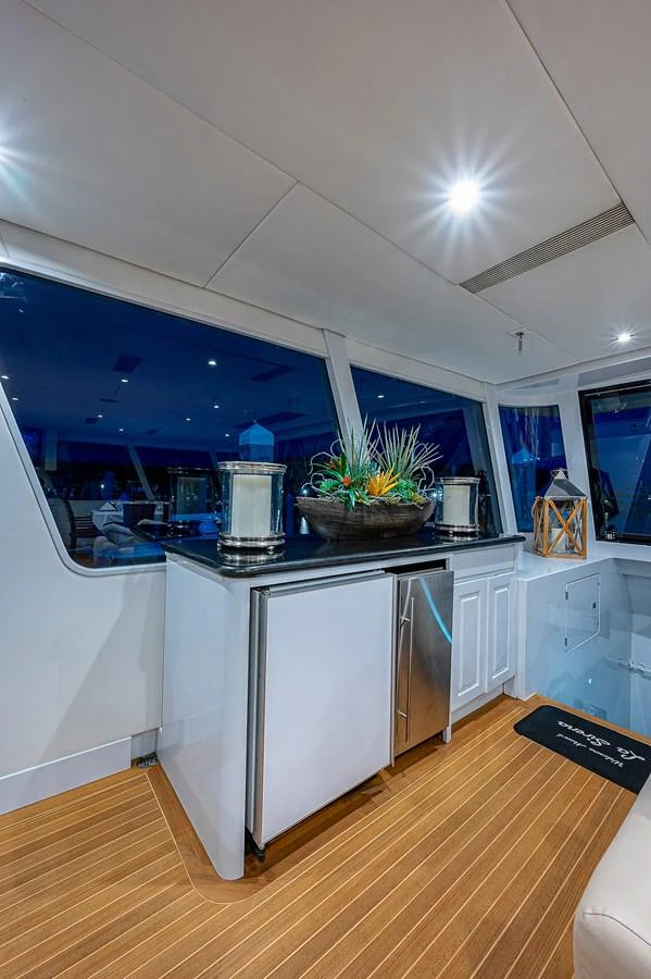 a kitchen with a large island aboard LA SIRENA Yacht for Sale