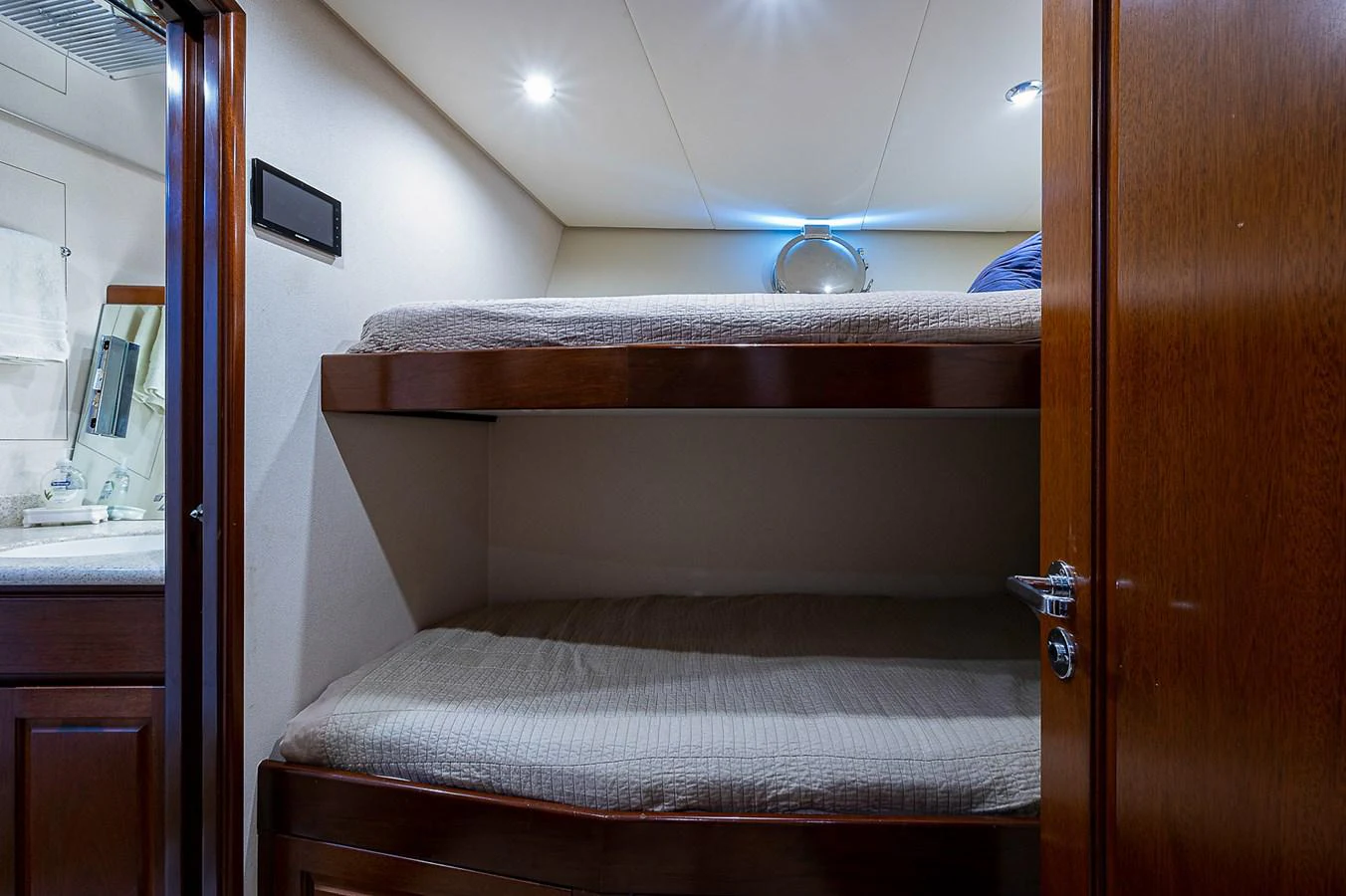 a bed in a room aboard LA SIRENA Yacht for Sale
