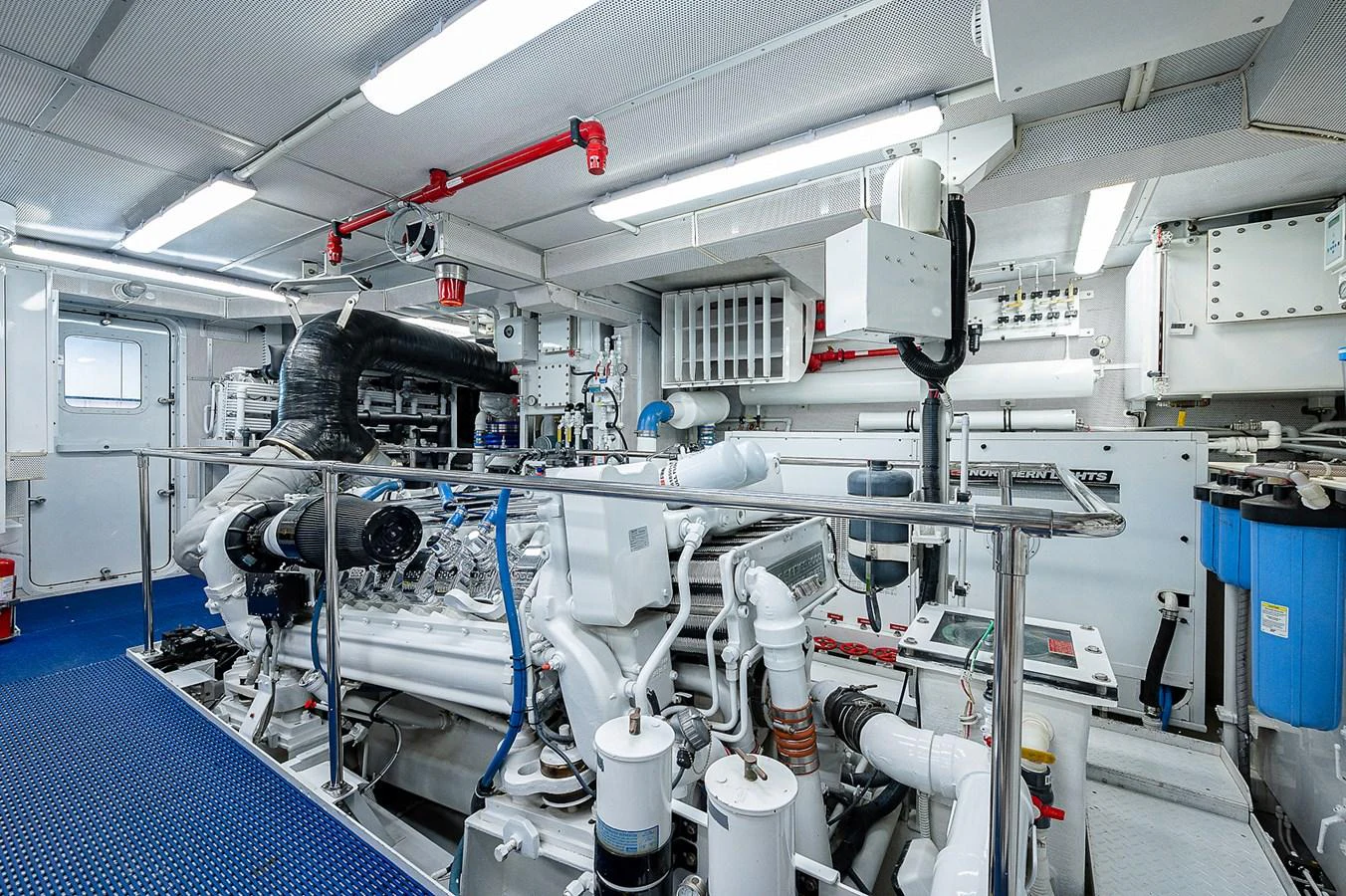 a room with blue pipes and white pipes aboard LA SIRENA Yacht for Sale