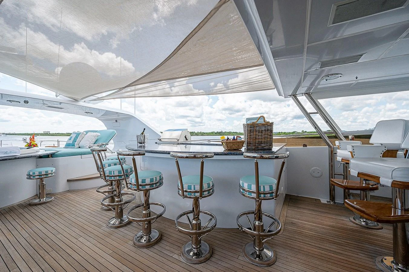 a room with tables and chairs aboard LA SIRENA Yacht for Sale