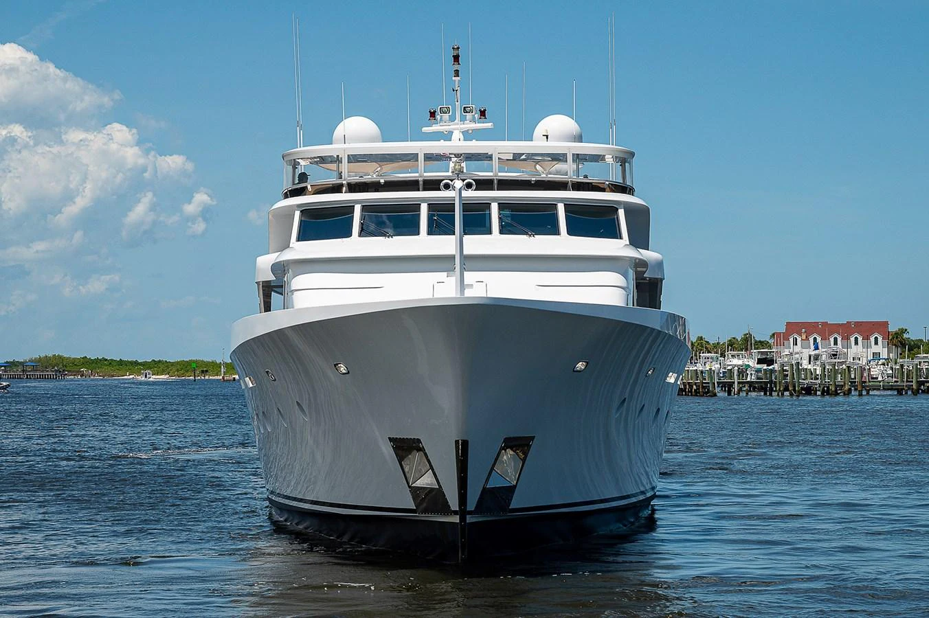 a large white boat in the water aboard LA SIRENA Yacht for Sale