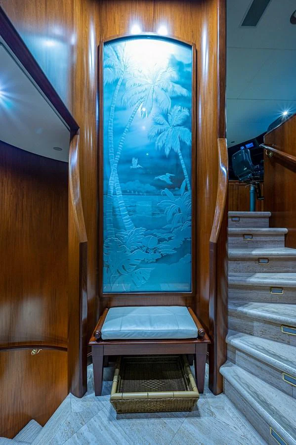a wooden staircase with a large glass door aboard LA SIRENA Yacht for Sale
