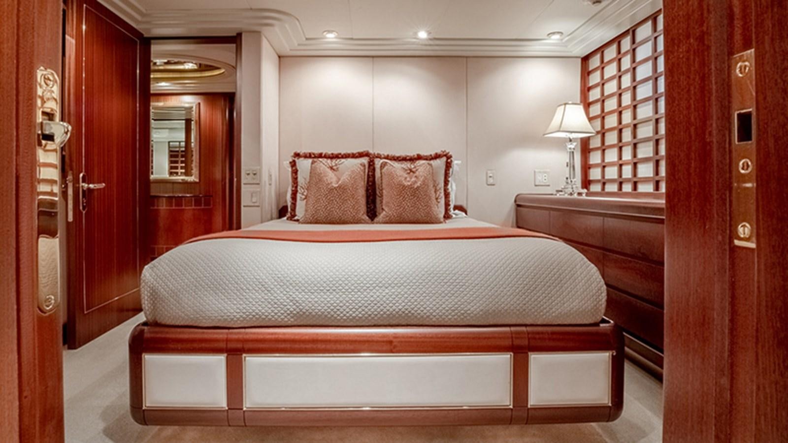 a bed in a room aboard NEVER ENOUGH Yacht for Sale