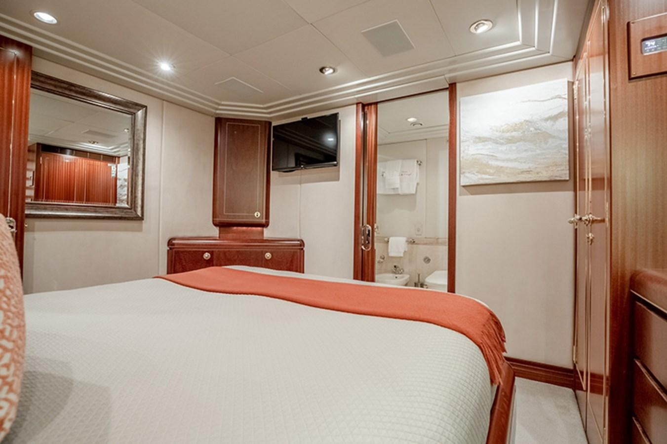 a bed in a room aboard NEVER ENOUGH Yacht for Sale
