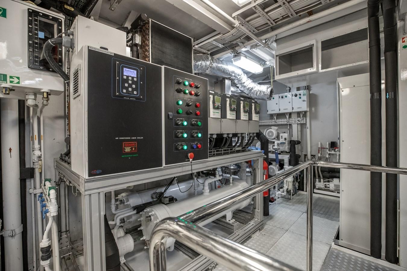 a large machine in a room aboard NEVER ENOUGH Yacht for Sale