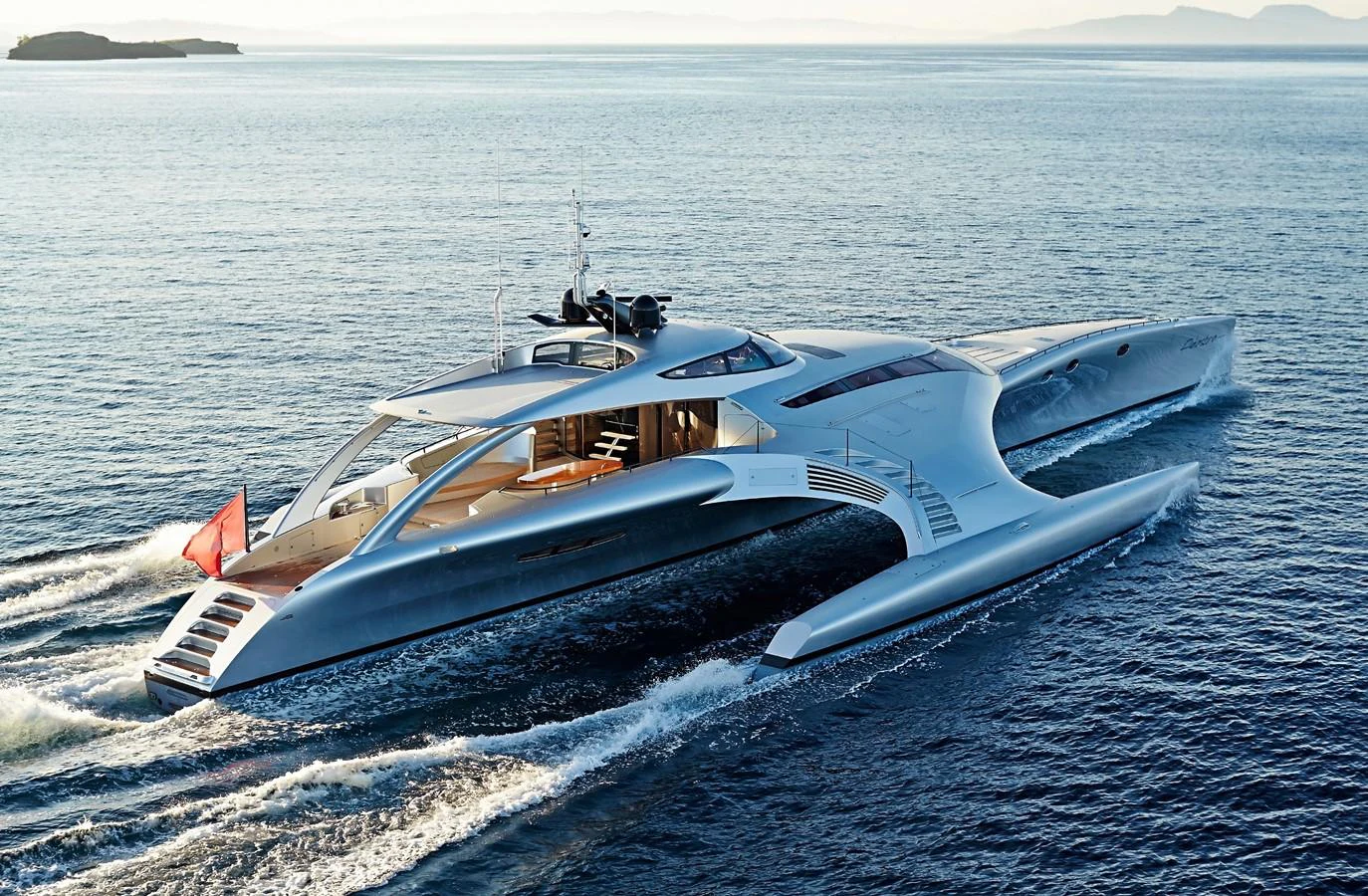 a white yacht in the water aboard ADASTRA Yacht for Sale