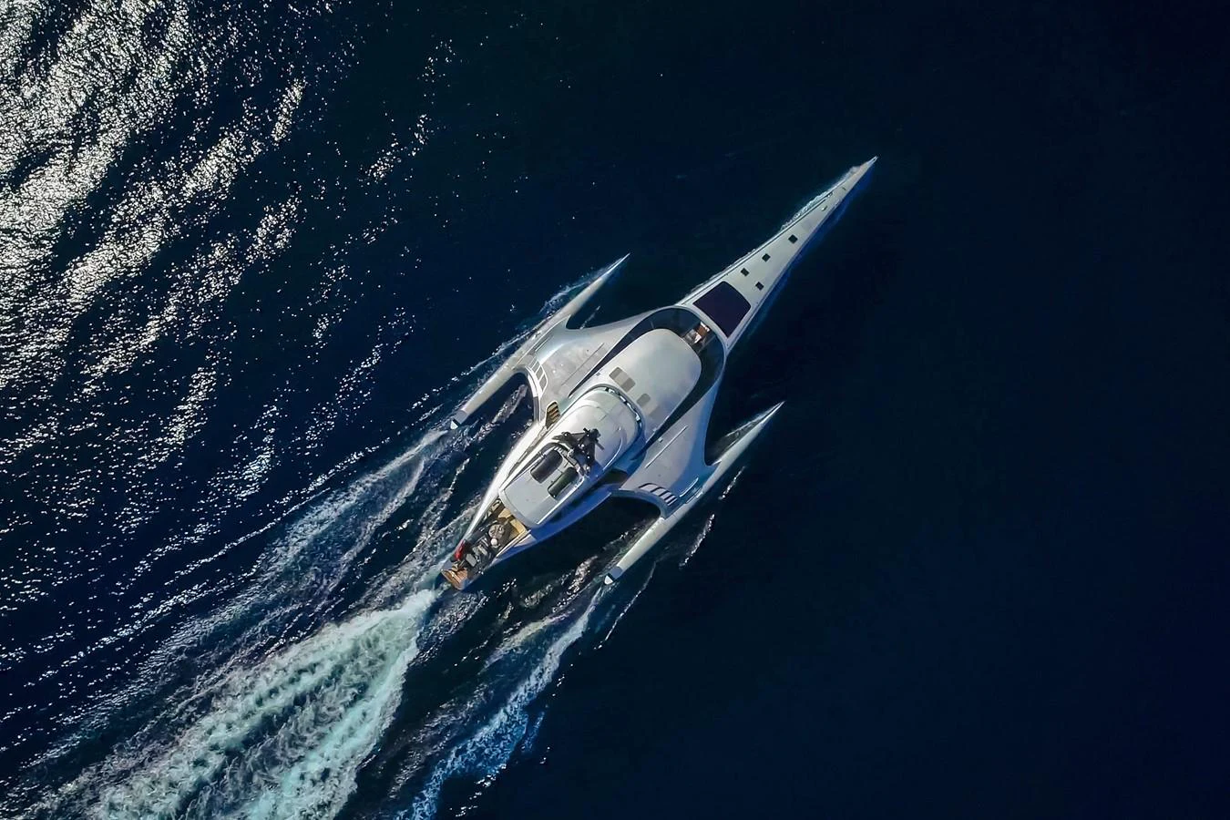 a space shuttle flying over earth aboard ADASTRA Yacht for Sale