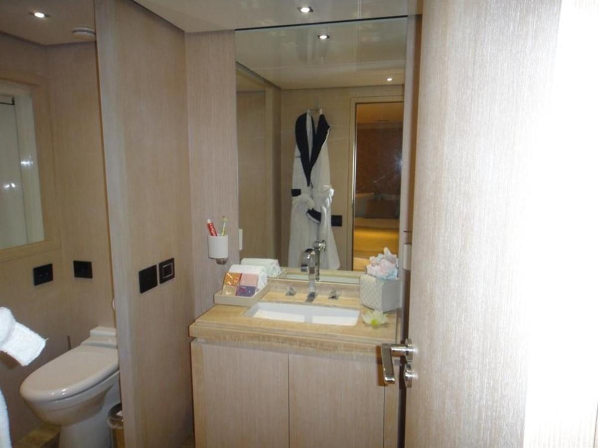 a bathroom with a sink and a mirror aboard BLUE EAST Yacht for Sale