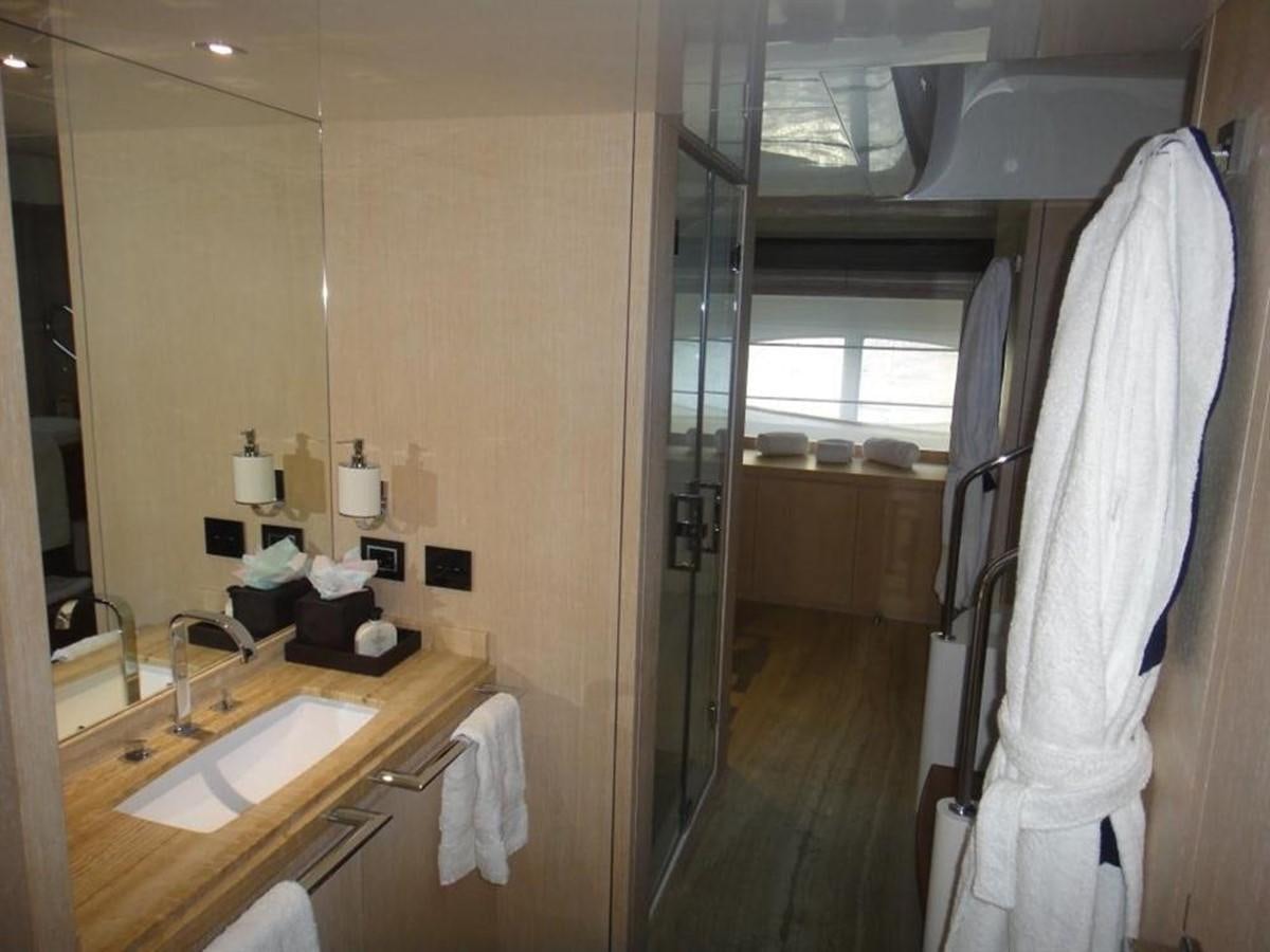a bathroom with a sink and a mirror aboard BLUE EAST Yacht for Sale