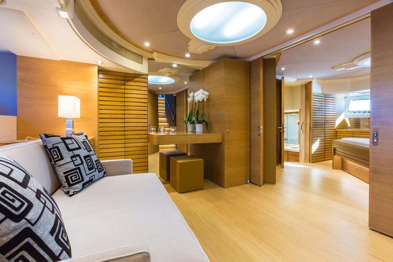 a hotel room with a bed and desk aboard AQUARELLA Yacht for Sale