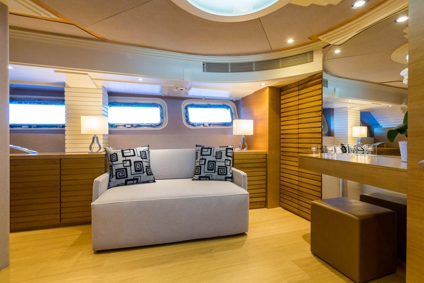 a room with a couch and a tv aboard AQUARELLA Yacht for Sale