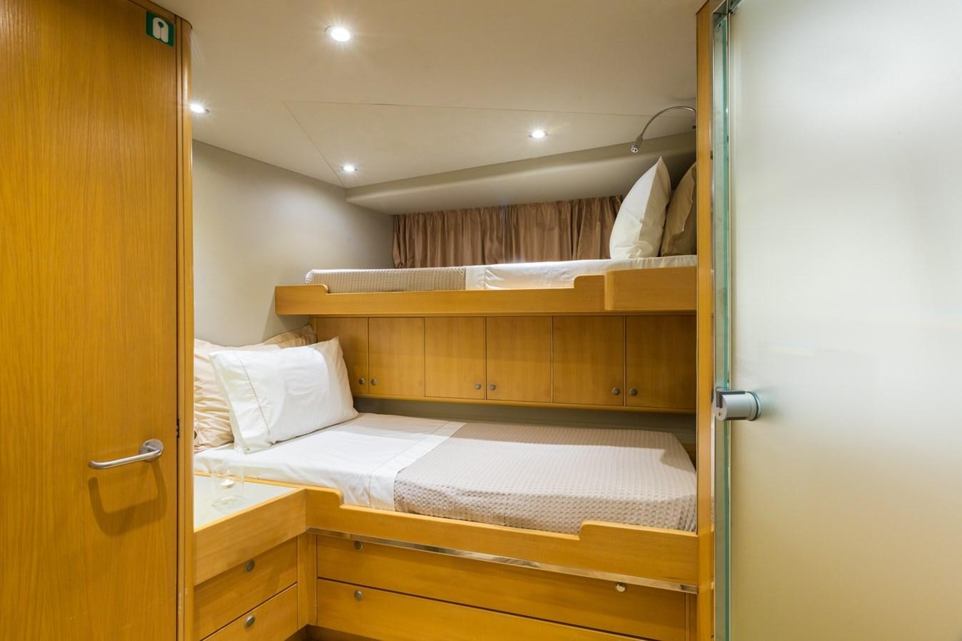 a room with bunk beds aboard AQUARELLA Yacht for Sale