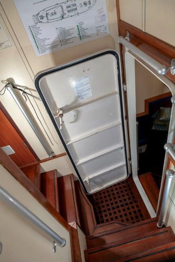 a silver refrigerator in a kitchen aboard SIR ROBERT BADEN POWELL Yacht for Sale