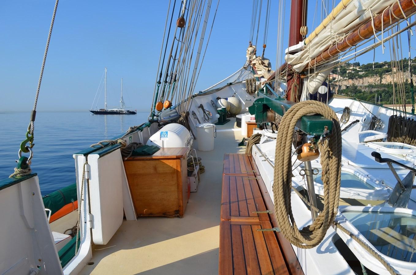 a boat docked at a pier aboard SIR ROBERT BADEN POWELL Yacht for Sale