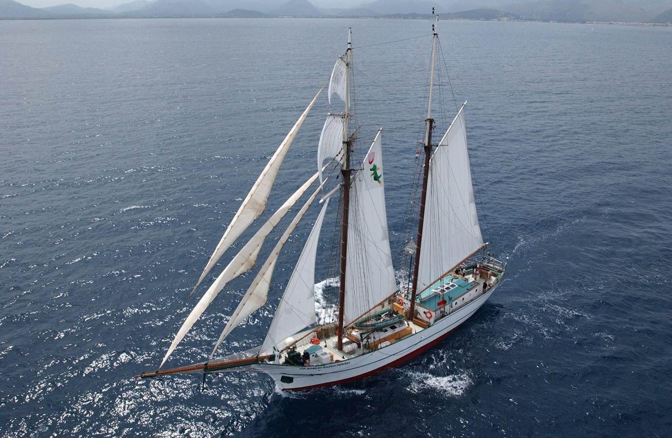 a sailboat on the water aboard SIR ROBERT BADEN POWELL Yacht for Sale