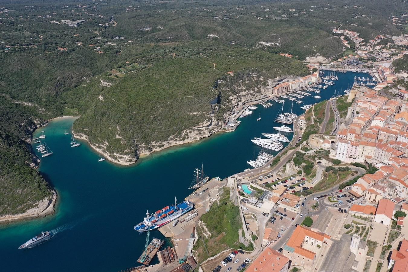 a city next to a body of water aboard SIR ROBERT BADEN POWELL Yacht for Sale