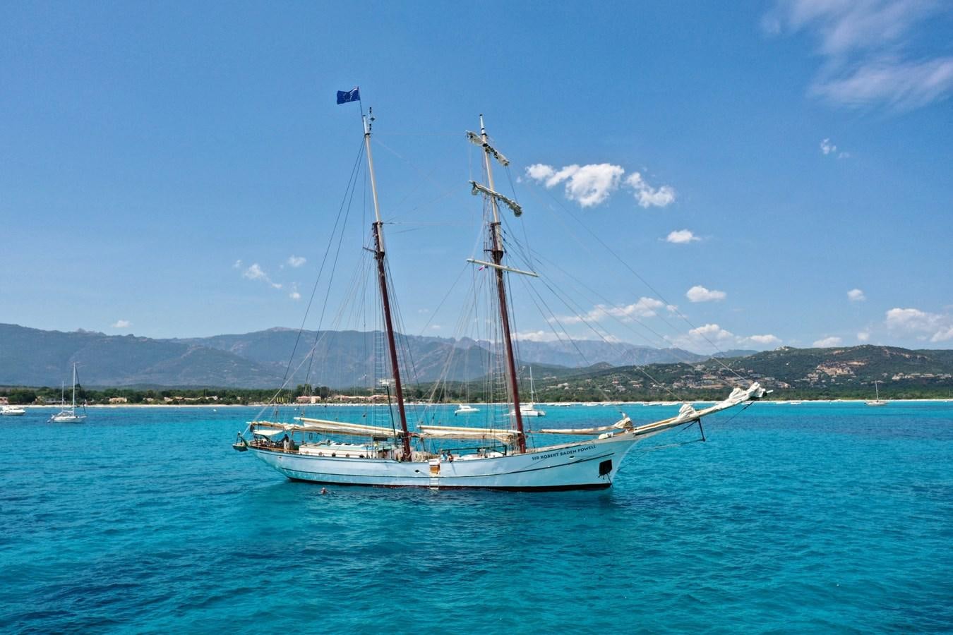 a sailboat on the water aboard SIR ROBERT BADEN POWELL Yacht for Sale