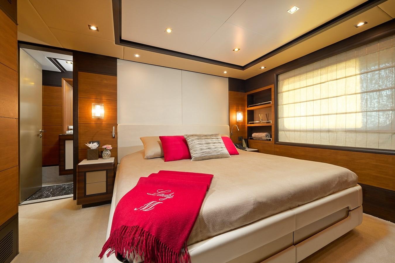 a hotel room with a bed aboard LADY MRD Yacht for Charter
