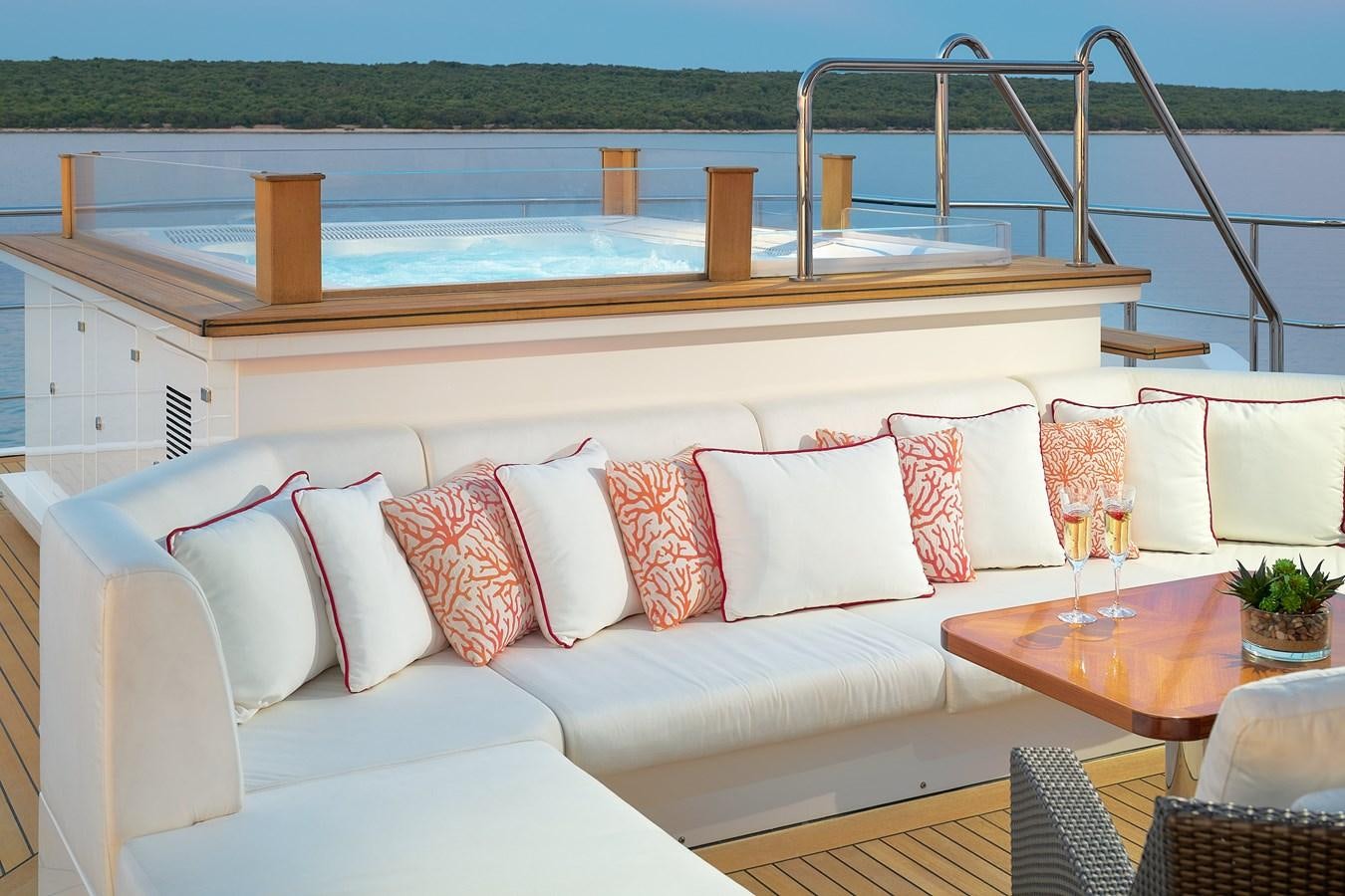 a white couch with pillows and pillows aboard LADY MRD Yacht for Charter