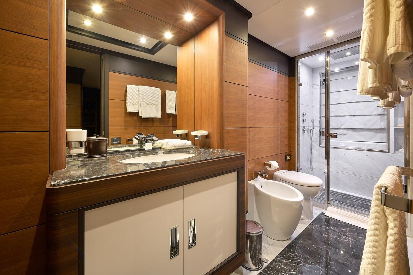 a bathroom with a large mirror aboard LADY MRD Yacht for Charter