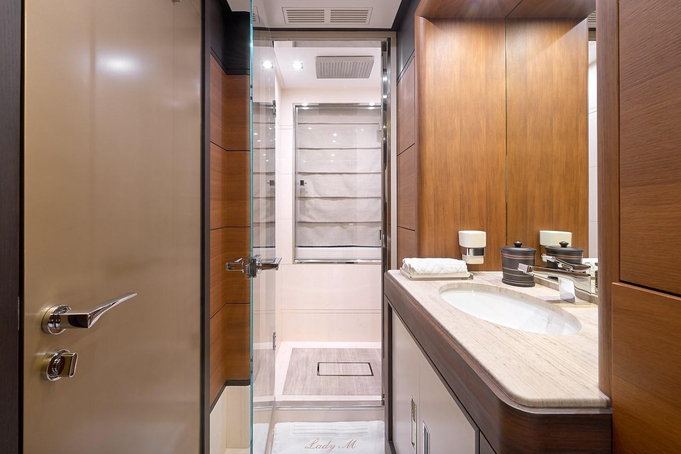 a bathroom with a sink and a shower aboard LADY MRD Yacht for Charter