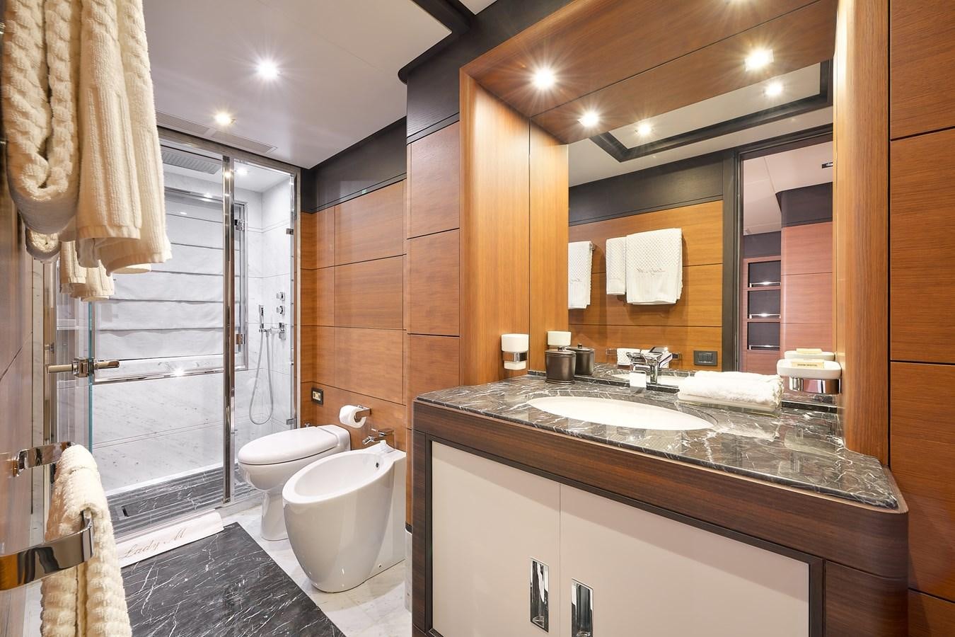 a bathroom with a large mirror aboard LADY MRD Yacht for Charter