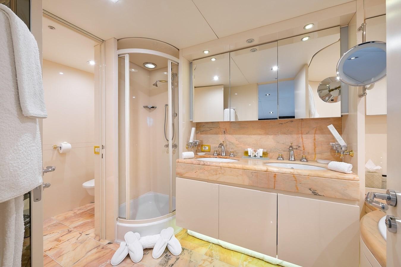 a bathroom with a standup shower aboard LADYSHIP Yacht for Charter