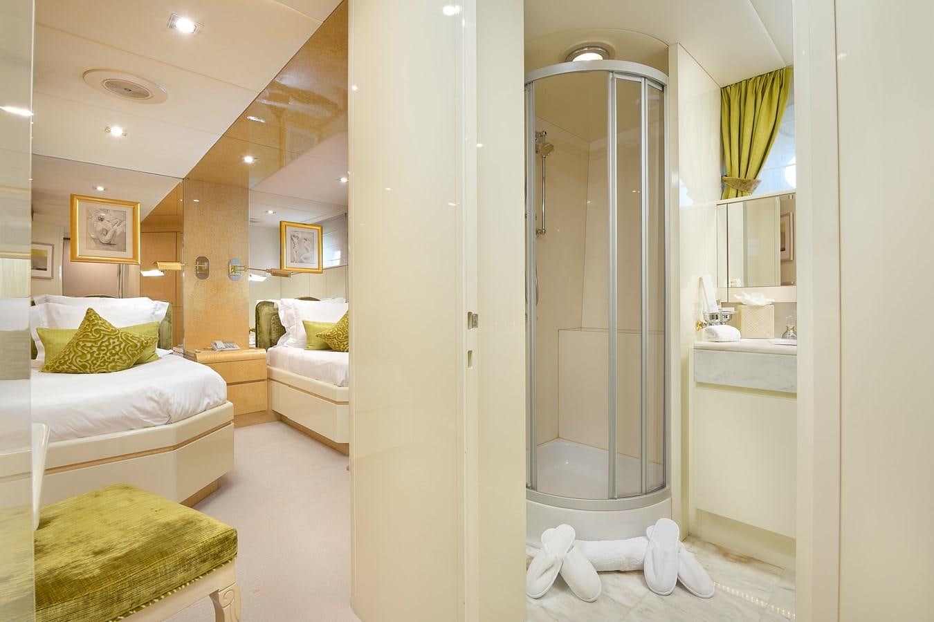 a bathroom with a glass shower aboard LADYSHIP Yacht for Charter
