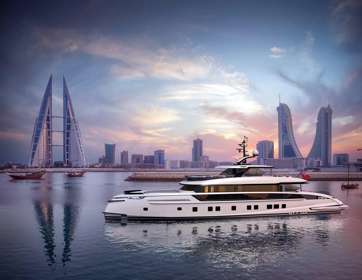 a boat in the water with a city in the background aboard DYNAMIQ GTT135 Yacht for Sale