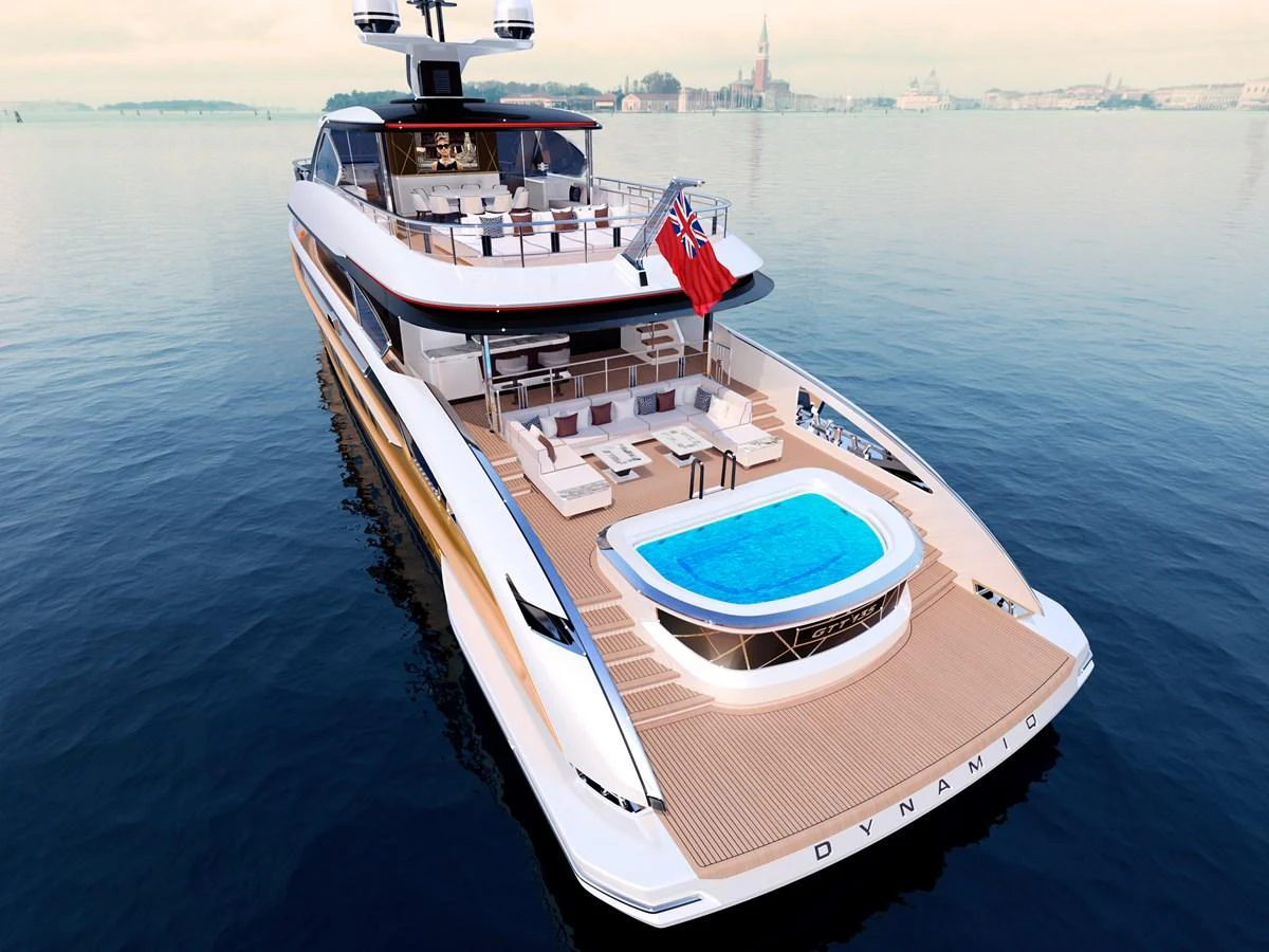 a large ship in the water aboard DYNAMIQ GTT135 Yacht for Sale