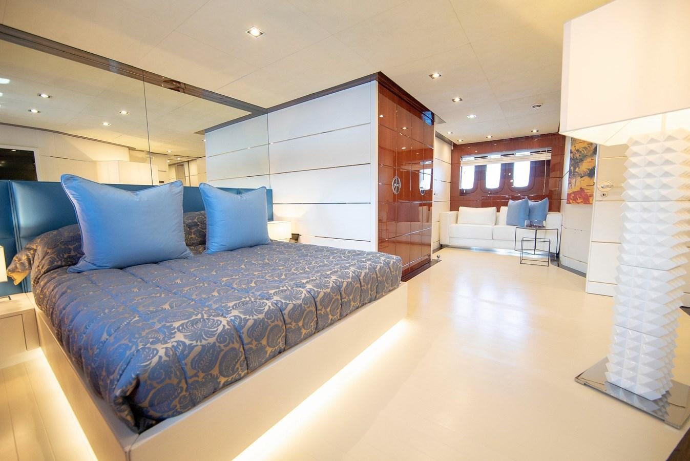 a large bed in a room aboard MAESTRO Yacht for Sale