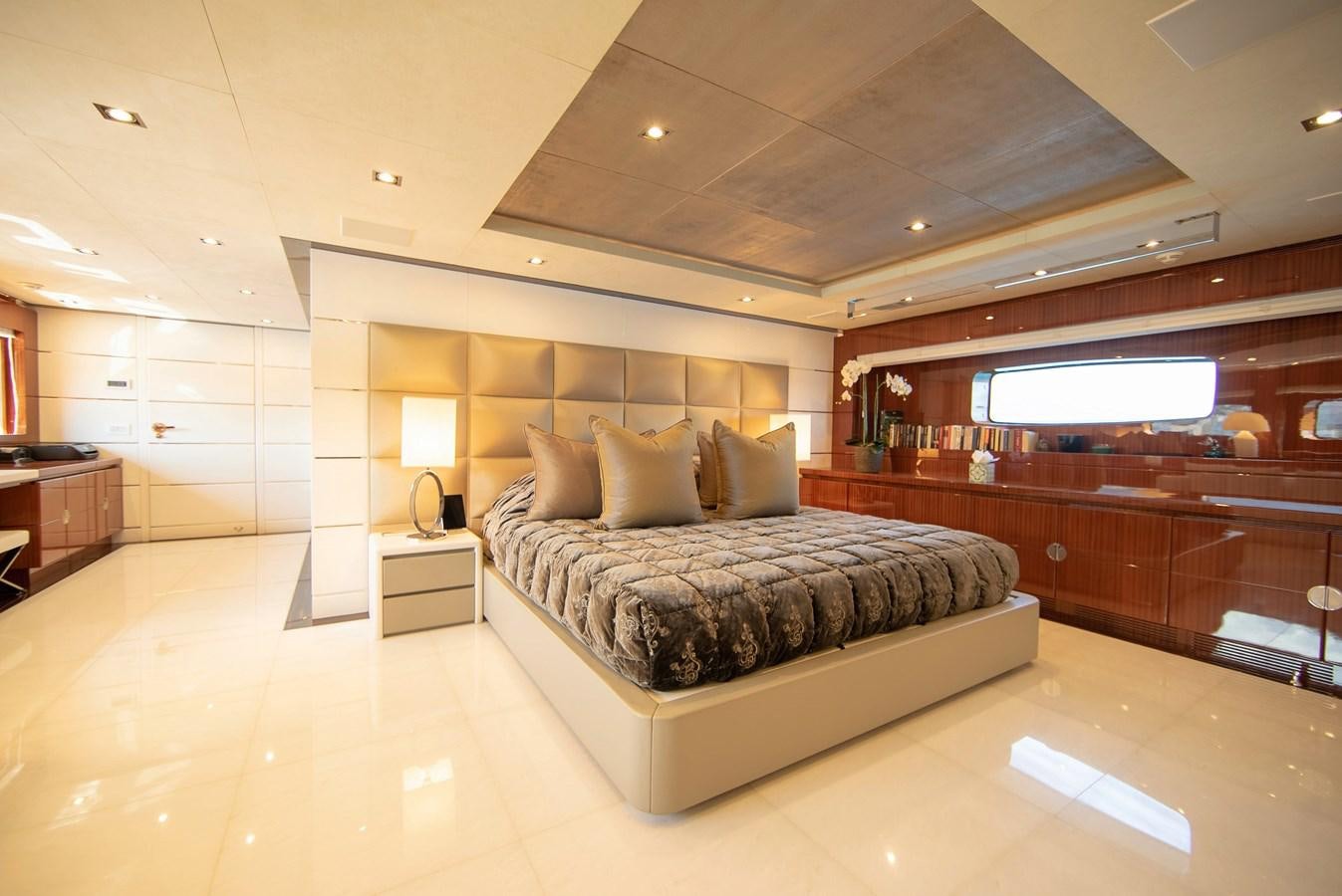 a large bed in a room aboard MAESTRO Yacht for Sale