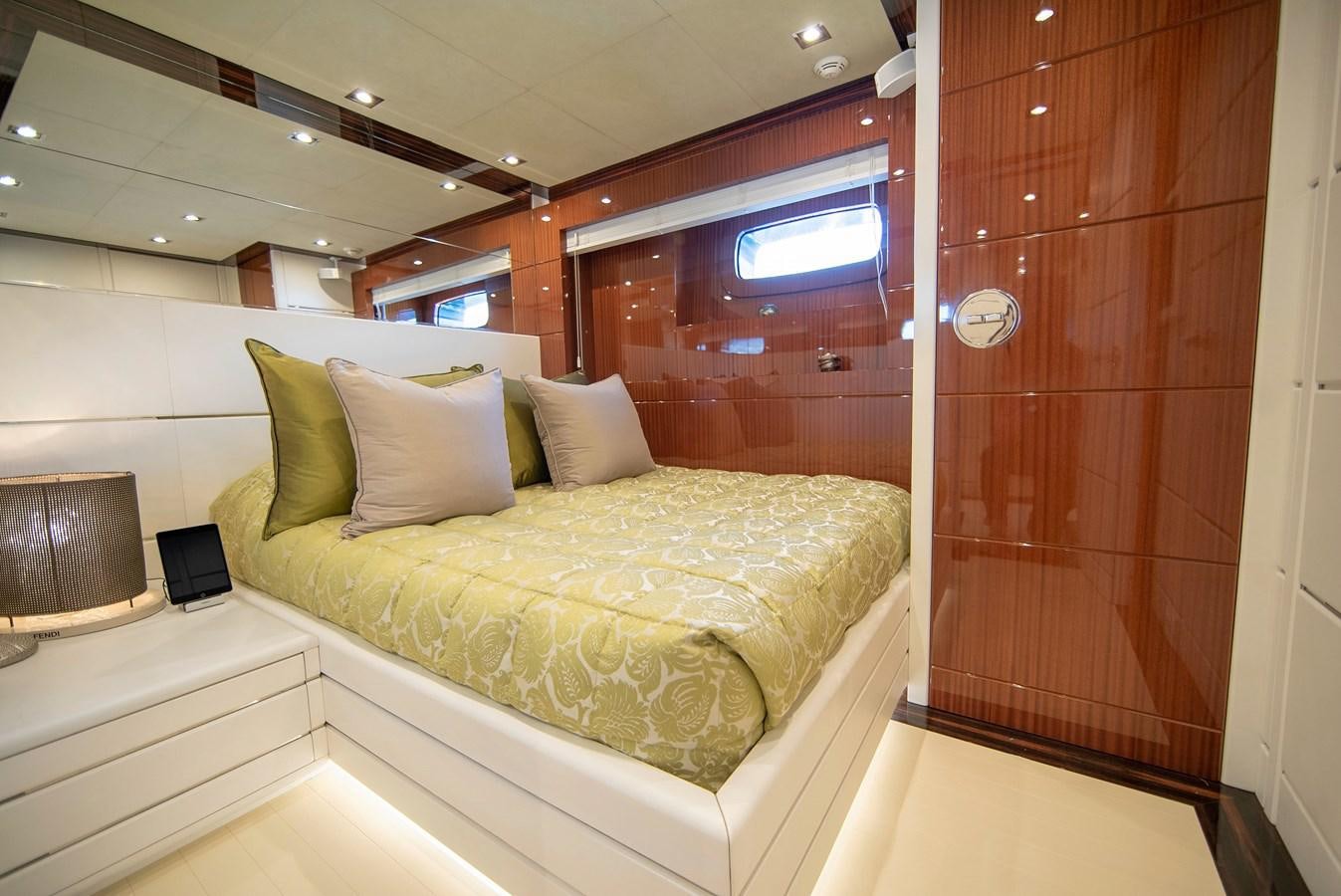 a bed in a room aboard MAESTRO Yacht for Sale