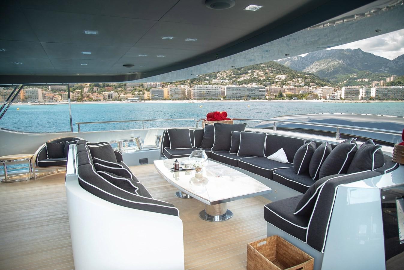 a room with a couch and a table and chairs aboard MAESTRO Yacht for Sale