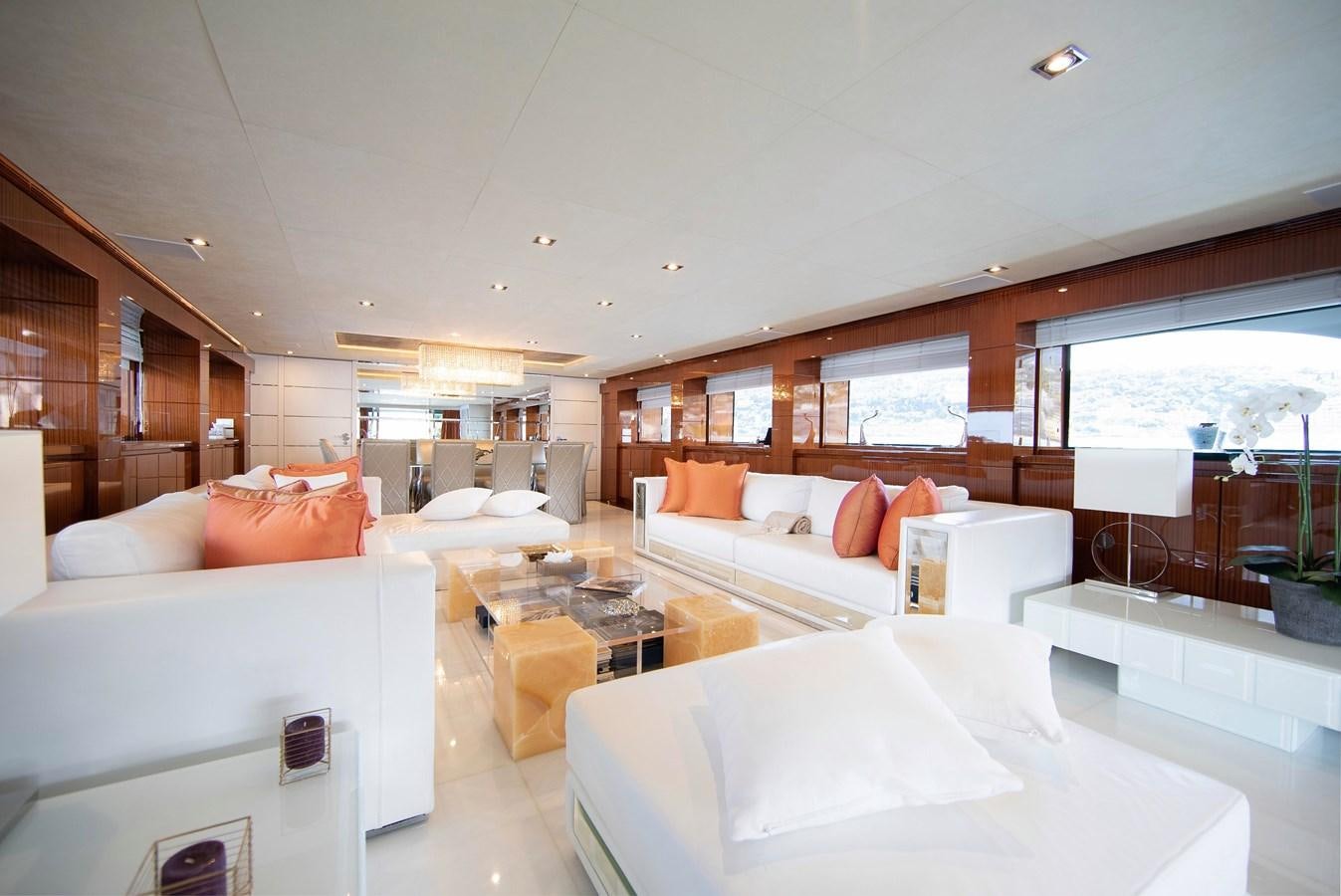a room with a bed and a table aboard MAESTRO Yacht for Sale