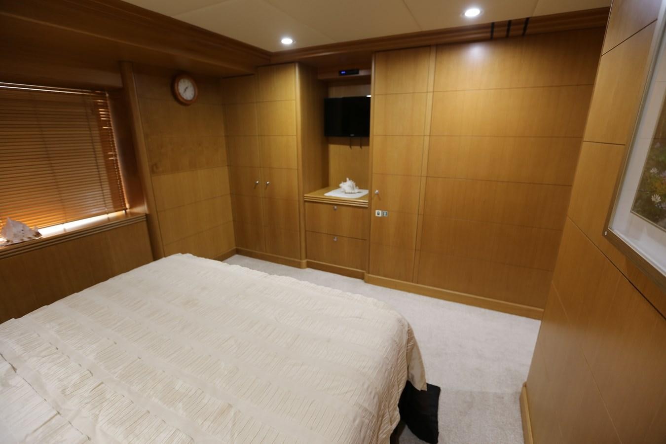 a room with a bed and a window aboard SEA HUNTER Yacht for Sale