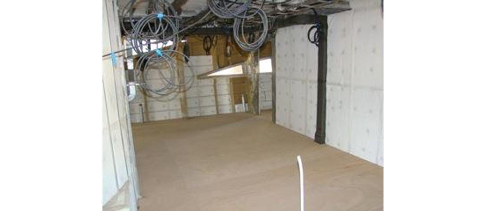 a room with a bike from the ceiling aboard C-347 Yacht for Sale