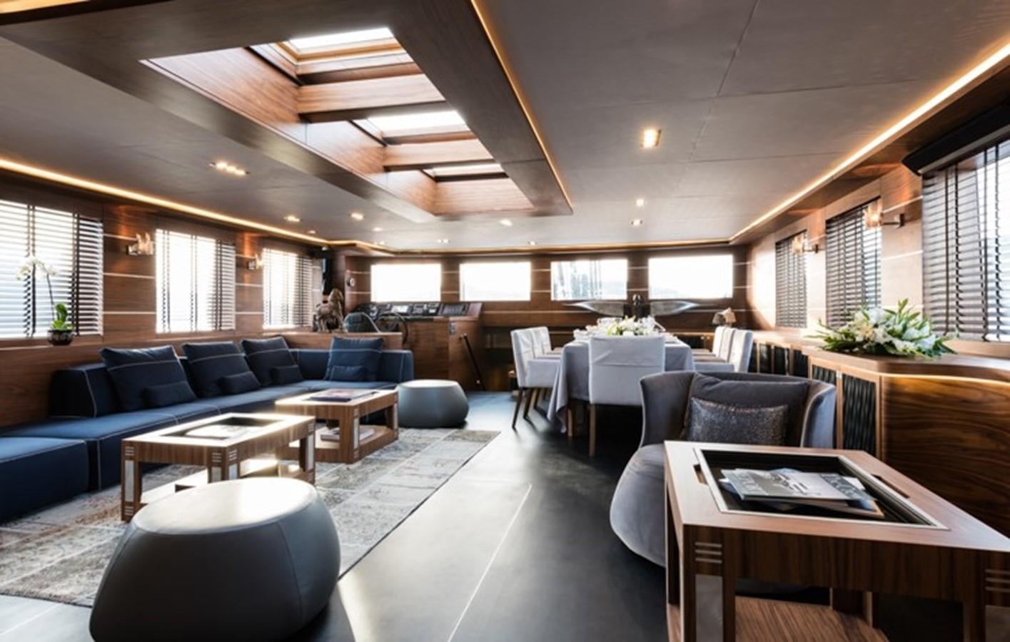 a living room with a couch and a table aboard ROX STAR Yacht for Charter