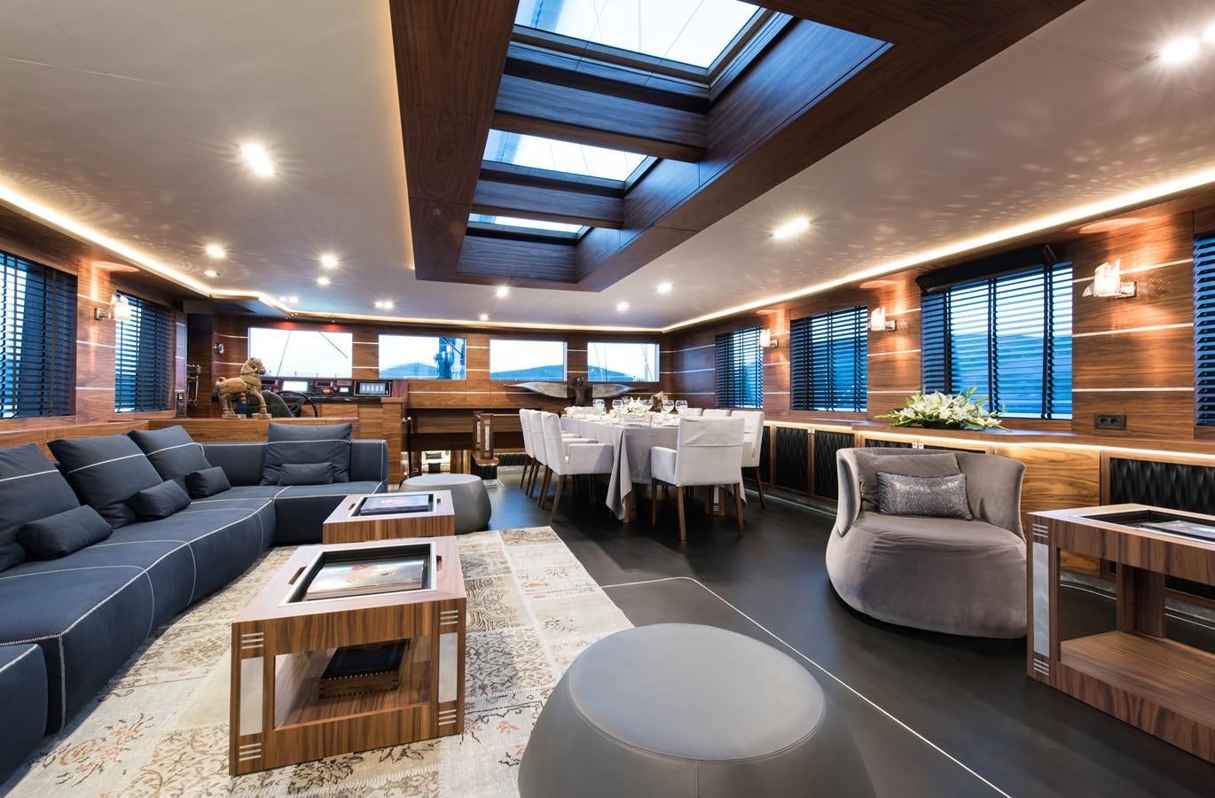 a living room with a couch and a table aboard ROX STAR Yacht for Charter