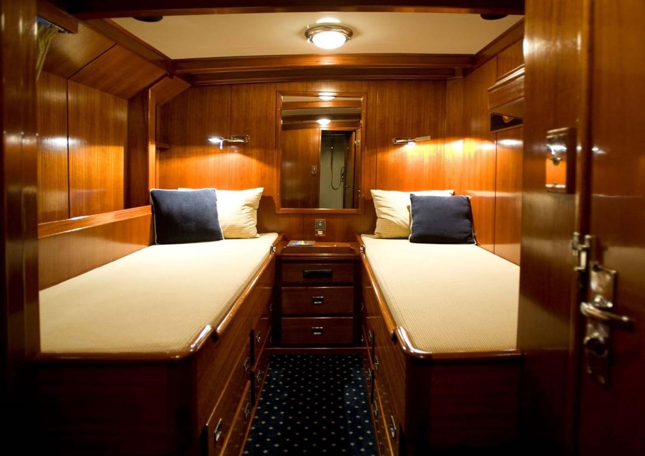 a room with two beds aboard CANDIDA Yacht for Sale