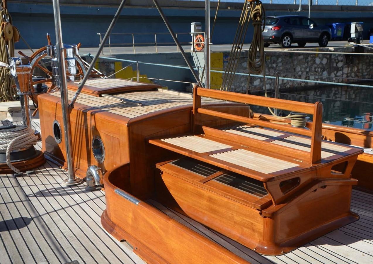 wooden benches on a deck aboard CANDIDA Yacht for Sale