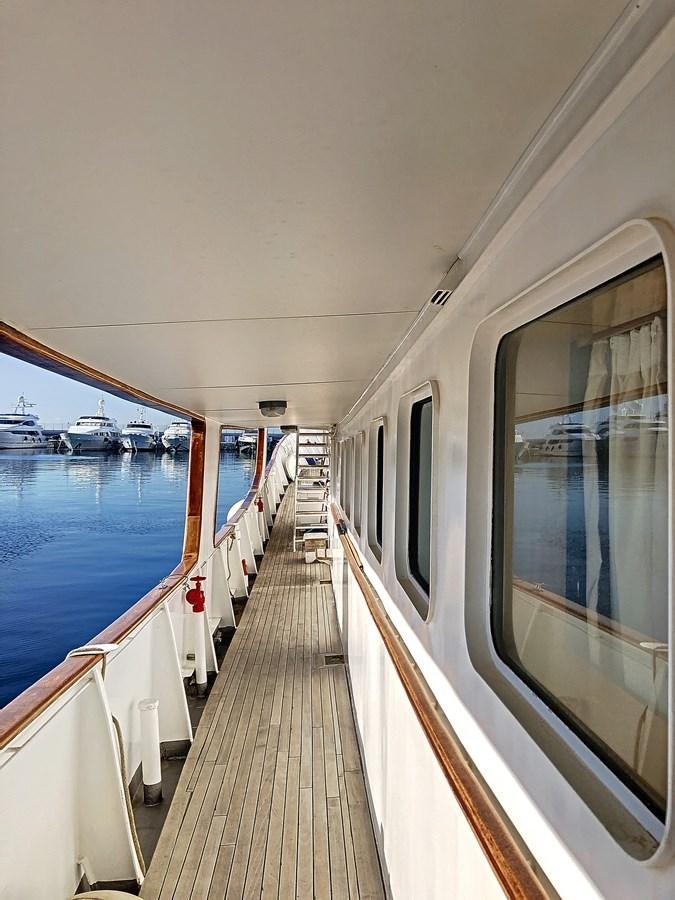 a train on the water aboard ELIKI Yacht for Sale