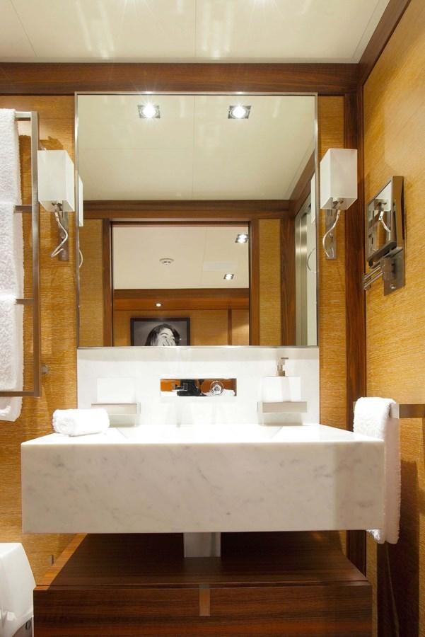 a bathroom with a large mirror aboard STATE OF GRACE Yacht for Charter
