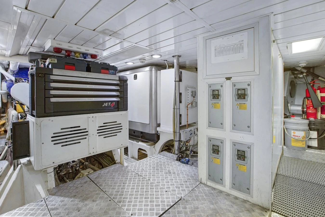 a large machine in a room aboard STATE OF GRACE Yacht for Sale