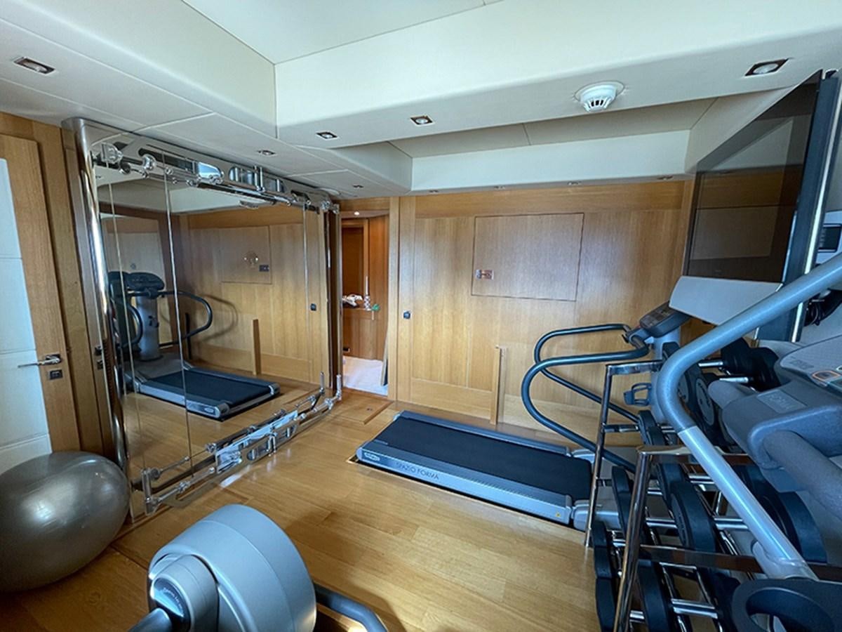 a gym with exercise equipment aboard EVIL ZANA Yacht for Sale
