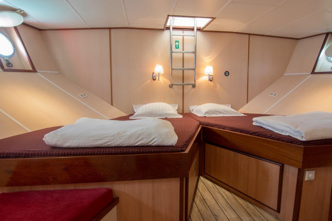 a room with two beds aboard ELDORADO Yacht for Sale