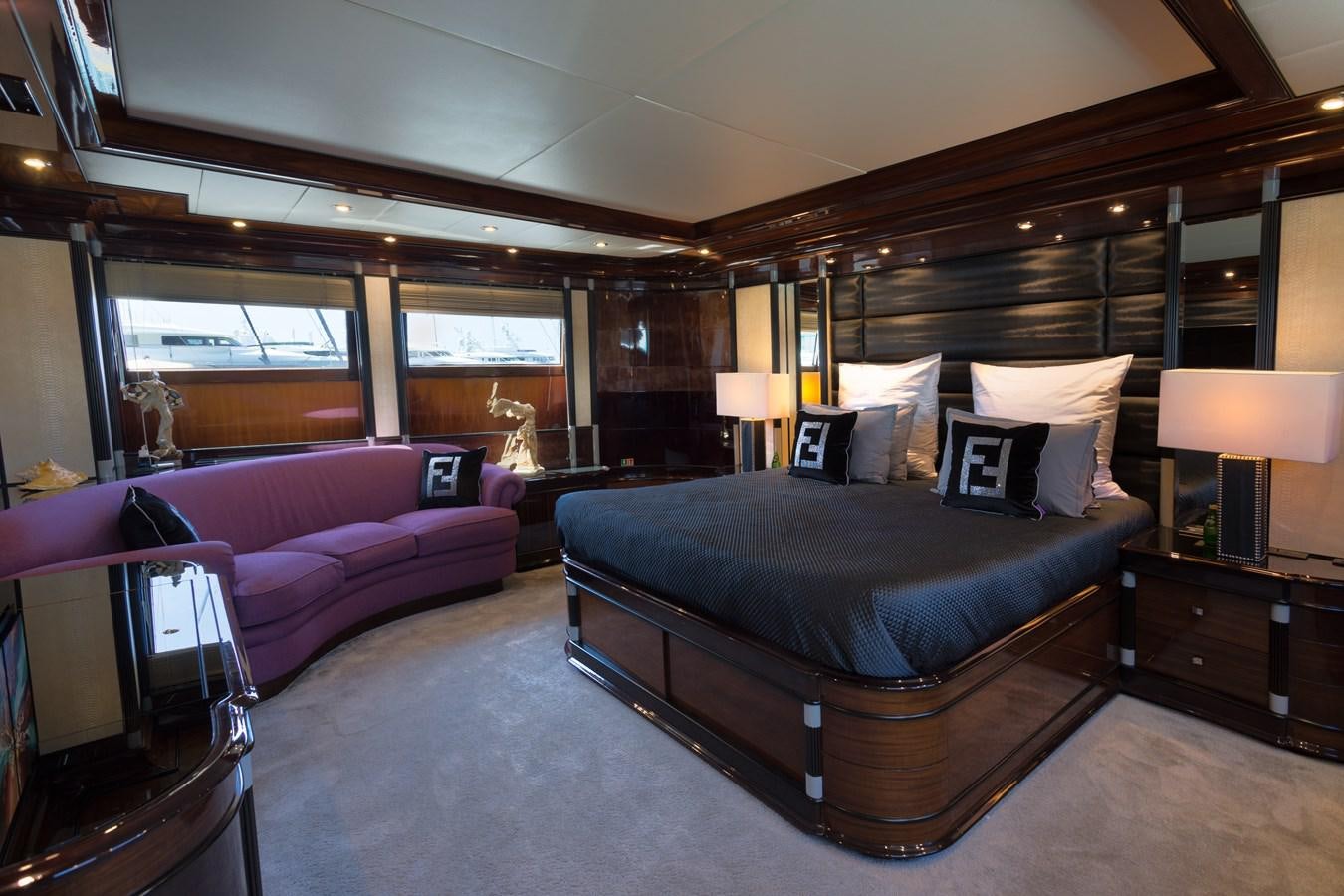 a large bed in a room aboard INDIGO STAR I Yacht for Charter