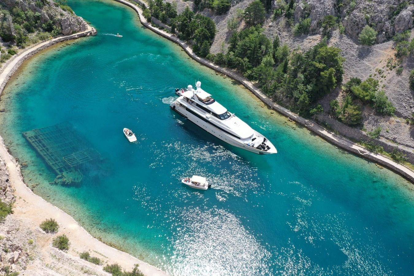 a group of boats on a river aboard INDIGO STAR I Yacht for Charter
