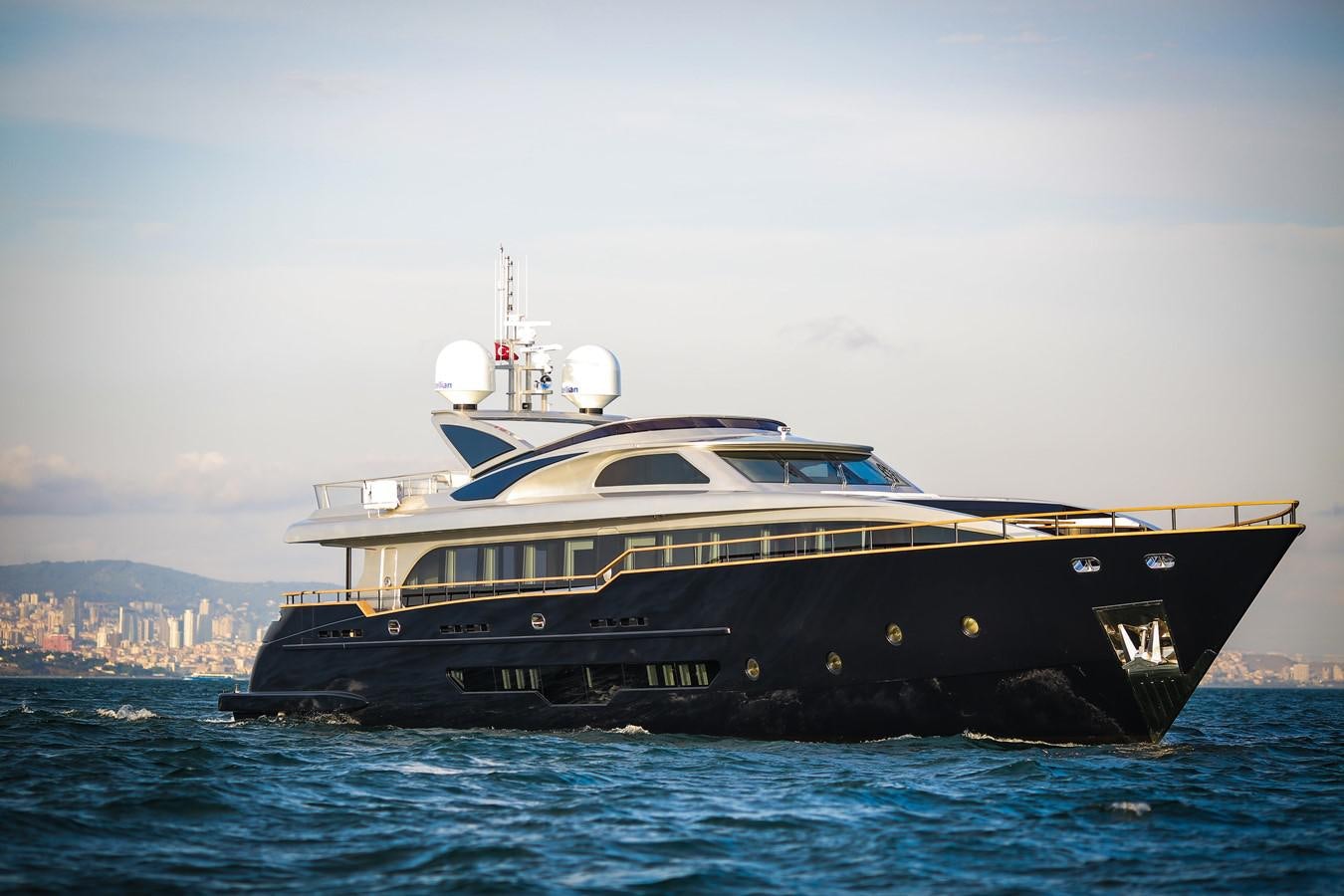 a large boat in the water aboard HARUN Yacht for Sale